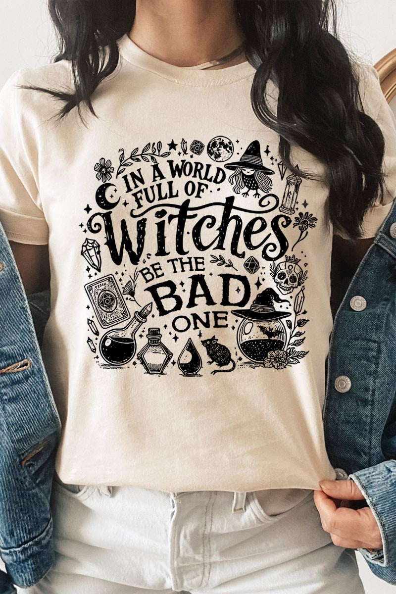 US3001P-E3139 In a World of Witches Graphic Plus Tee $16
