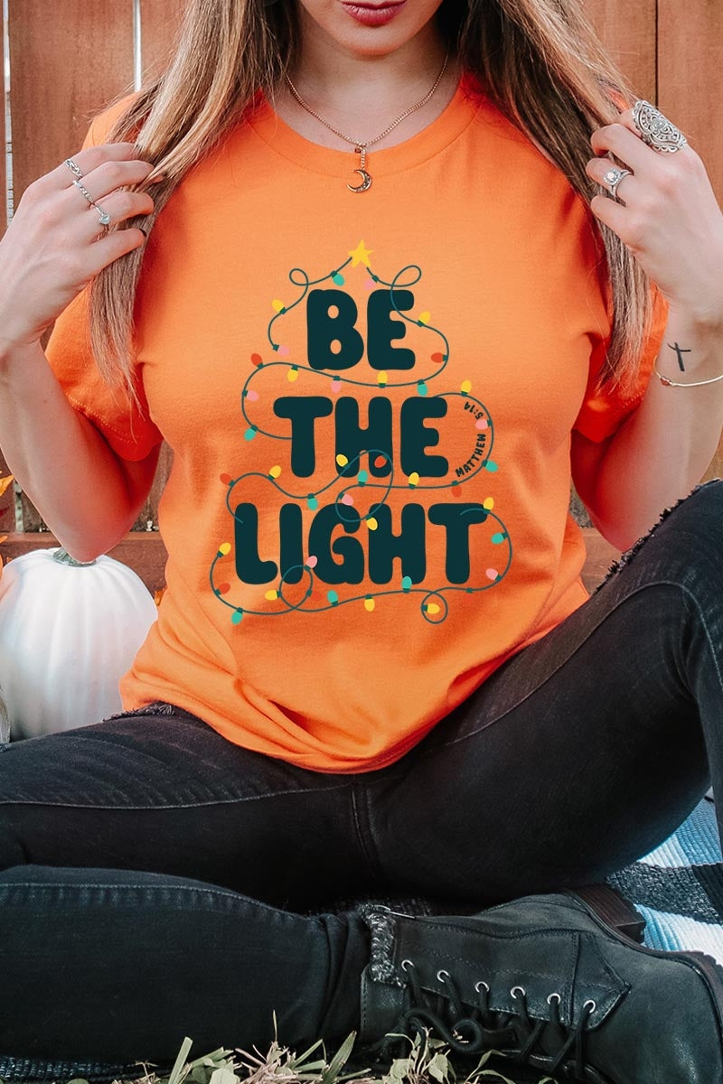 US3001-E3202 Be the Light Christmas Graphic Tee $12.5