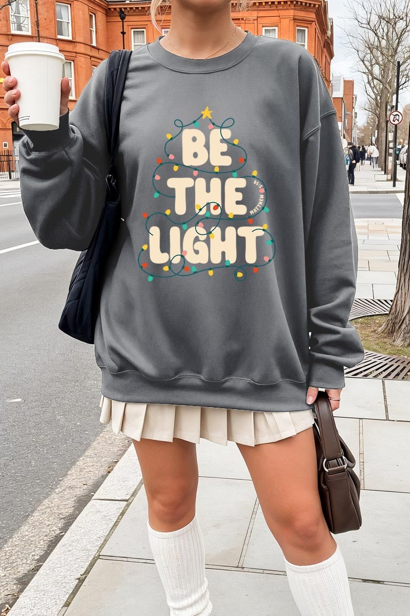 UL180-E3202 Be the Light Christmas Graphic Sweatshirt $20