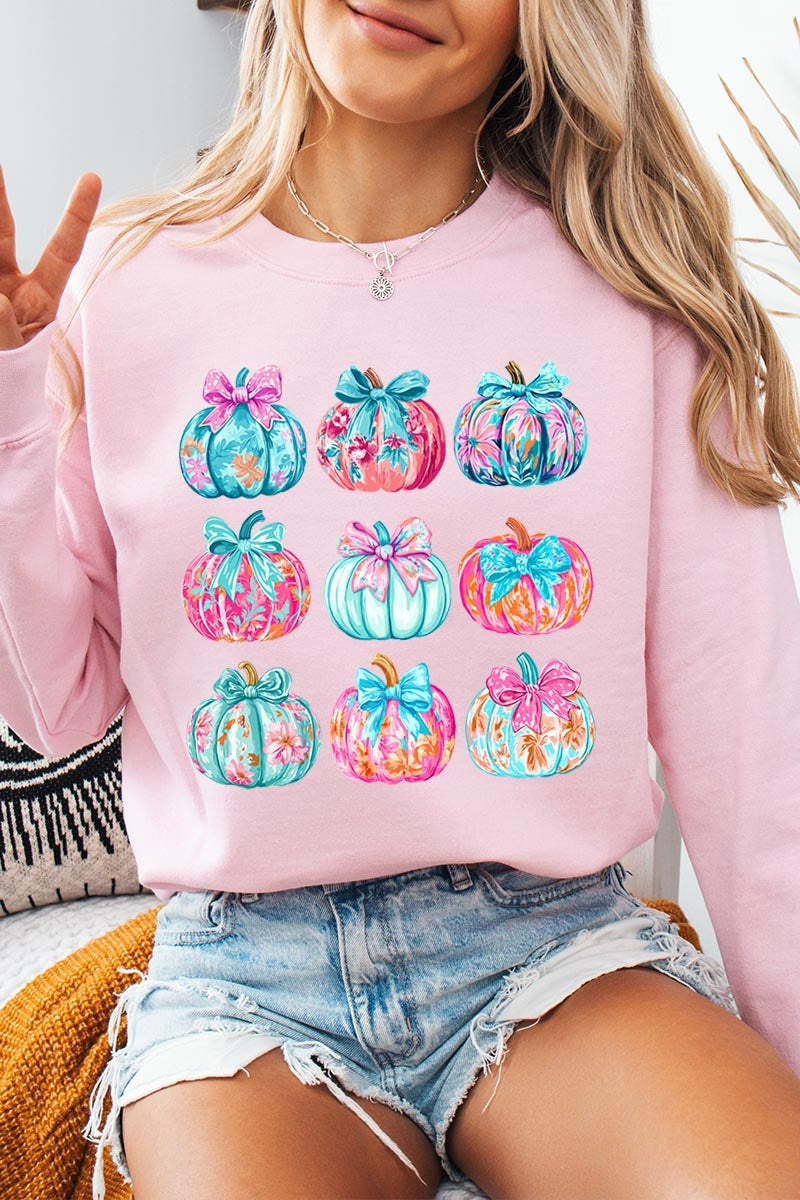 UL180P-E3137 Coquette Pumpkin Graphic Plus Sweatshirt $25